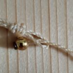 Ras de cou bohème en macramé beige avec pierre quartz rose et perles laiton